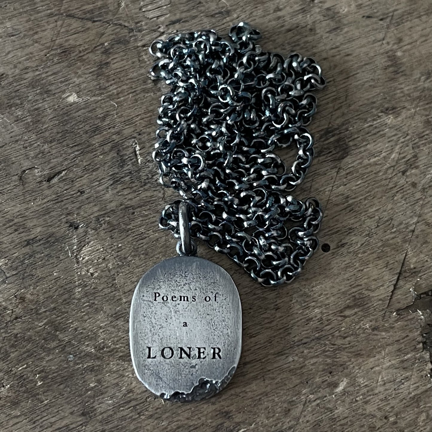 Poems of a Loner pendant