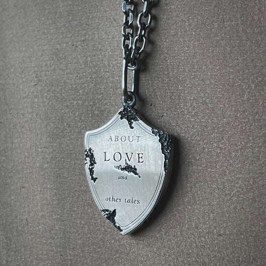 About love shield pendant